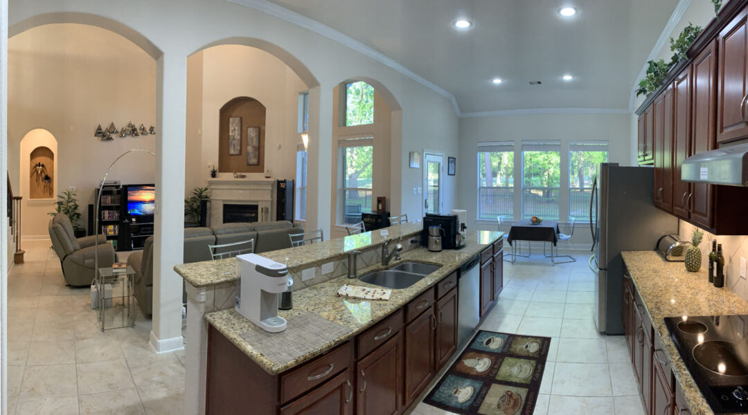 Kitchen view to Family Room and golf course